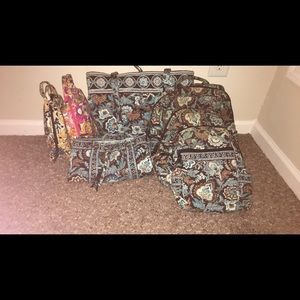 4 Vera Bradley book bags, 1 tote, & 2 lunch boxes.